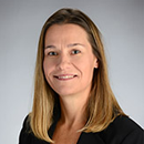 Dr. Skylar Bellinger, a woman with curly blonde hair