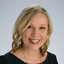 Dr. Skylar Bellinger, a woman with curly blonde hair
